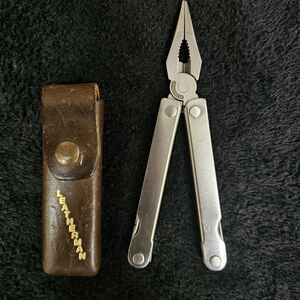 Leatherman Silver Multi-Tool with Brown Leather Sheath